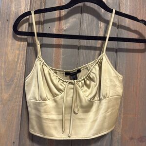 Light green satin crop
Top adjustable straps size small